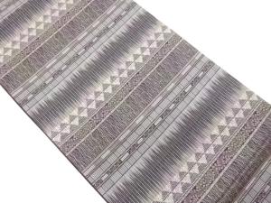 横段に花唐草・鱗模様織出し全通洒落袋帯